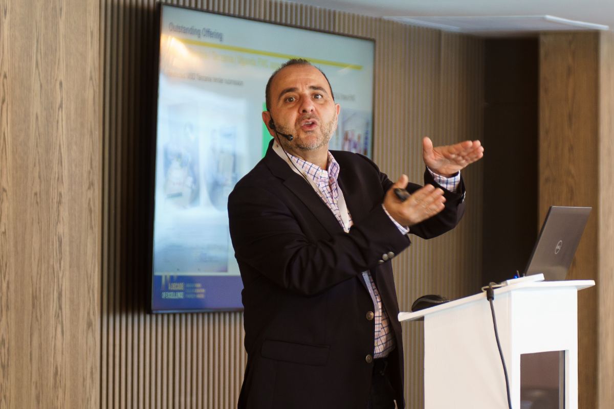Conference speaker presenting at a corporate healthcare event in Cape Town